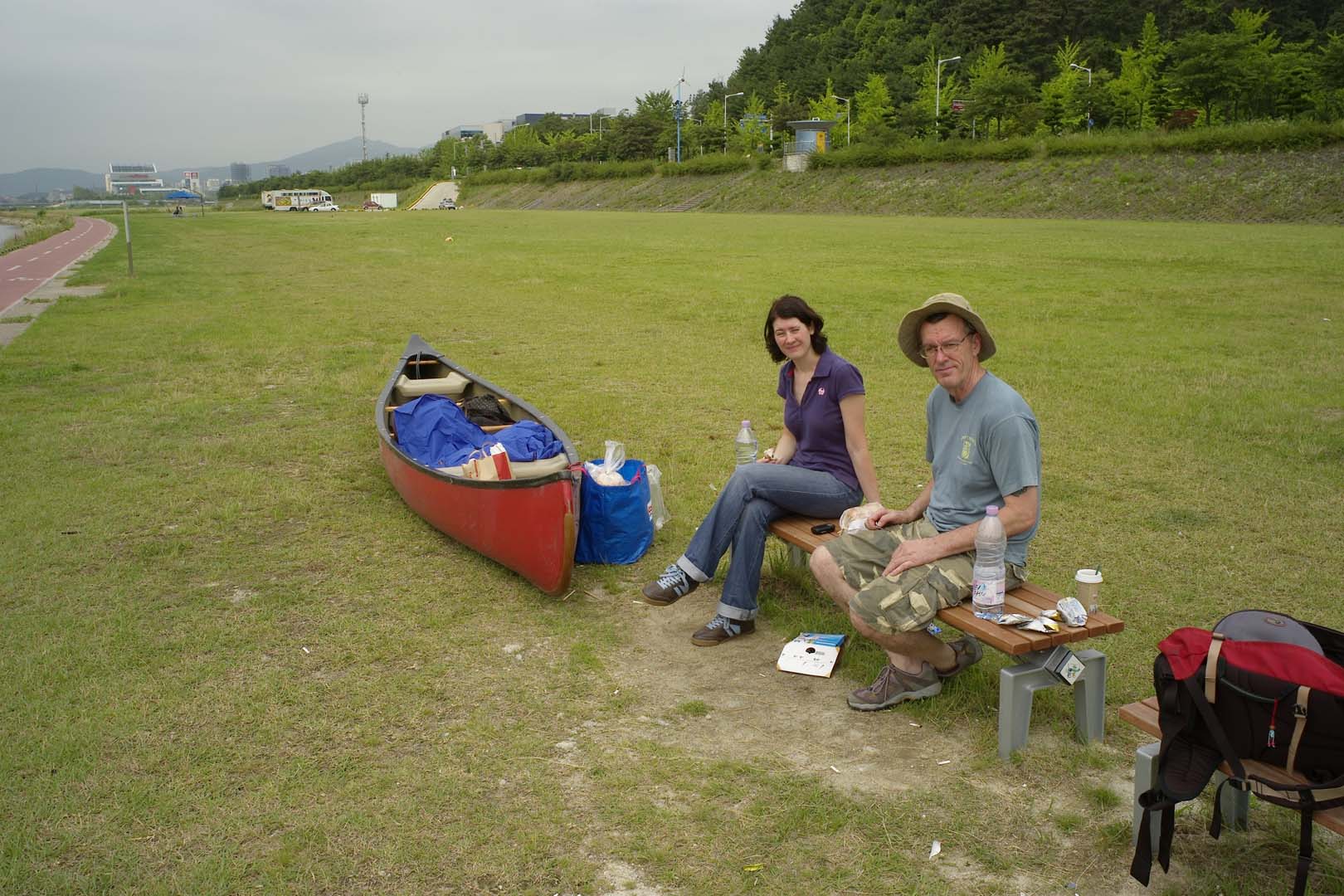 people siting at camp site